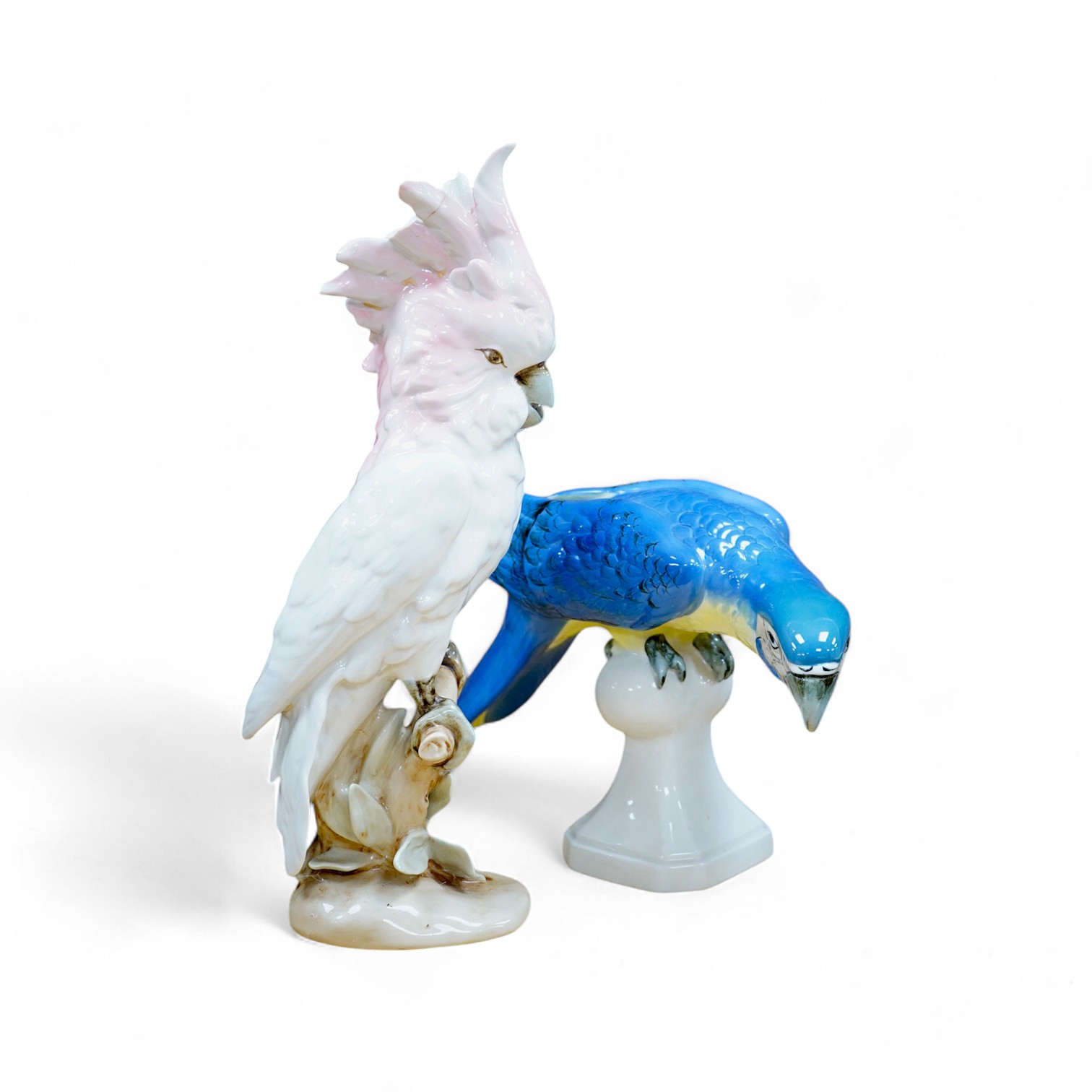 A Royal Dux porcelain model of a parrot and cockatoo, tallest 38cm. Condition - fair